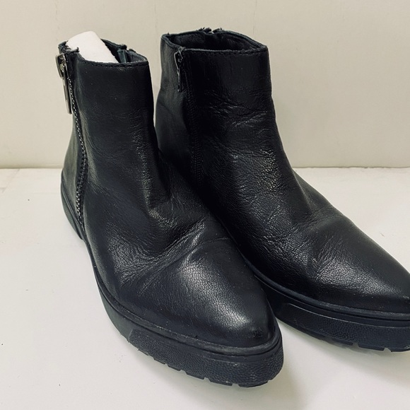 black flat pointed toe boots